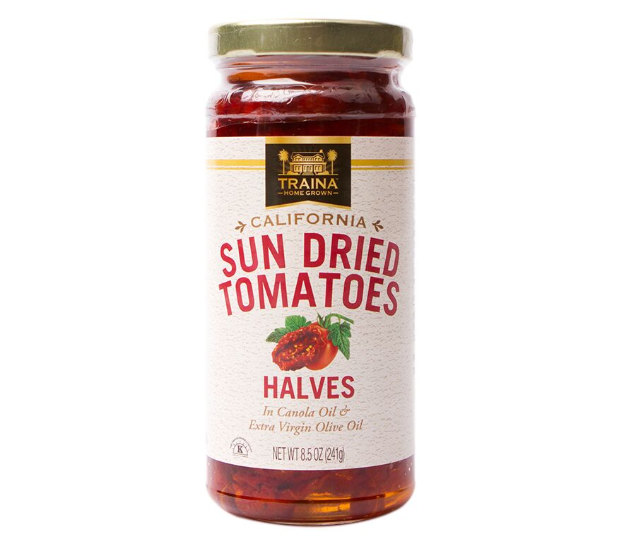 Traina® Home Grown California Sun Dried Tomatoes in Oil, Halves, in a glass jar with twist cap. Our rich red tomatoes are dried slowly under the California sun. Preserved in a flavorful oil and special spice blend. Ideal for enhancing antipasti and charcuterie boards delicious when added to recipes.