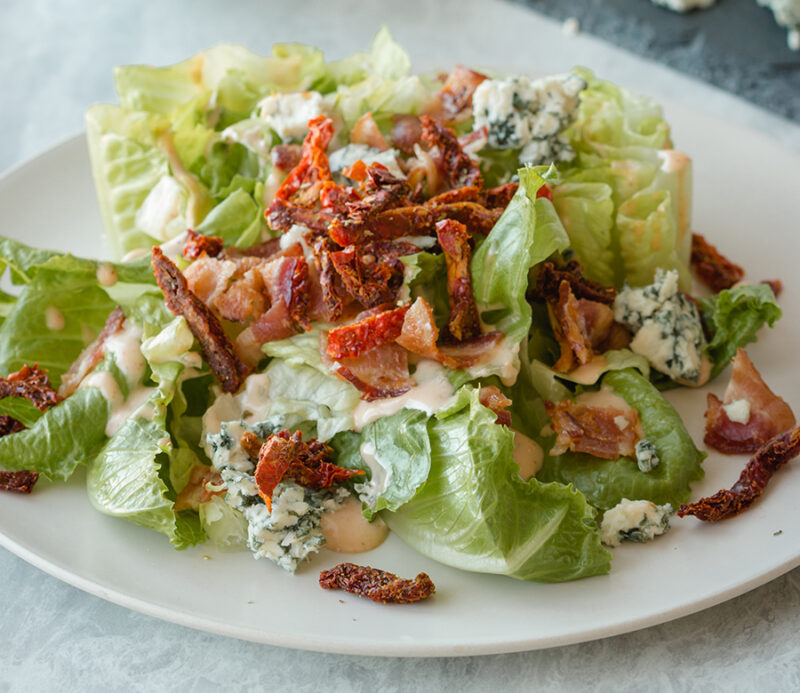 A salad with sun dried tomatoes from Traina Home Grown.