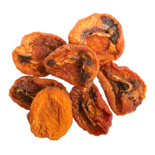 Small pile of Organic California Sun Dried Apricot Halves with varied colors ranging from dark brown to deep orange.